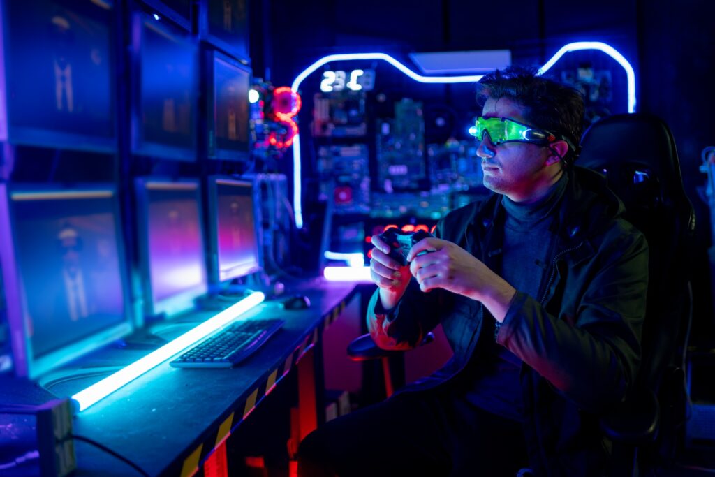 Caucasian gamer man wear special eye glasses and hold and use joy control to play game